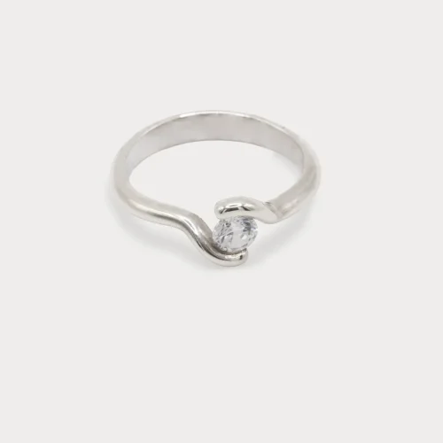 Solitario cruzado de oro blanco 18k con diamante talla brillante de 0.35ct G/VS
